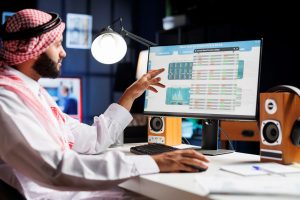 muslim-guy-checking-charts-data