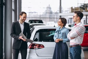 Young family buying a car in Dubai